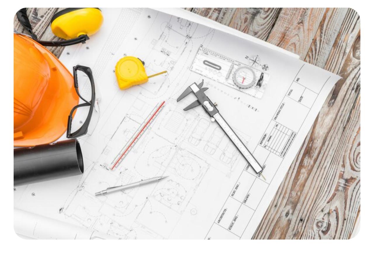 Equipo de Perapgo mirando planos